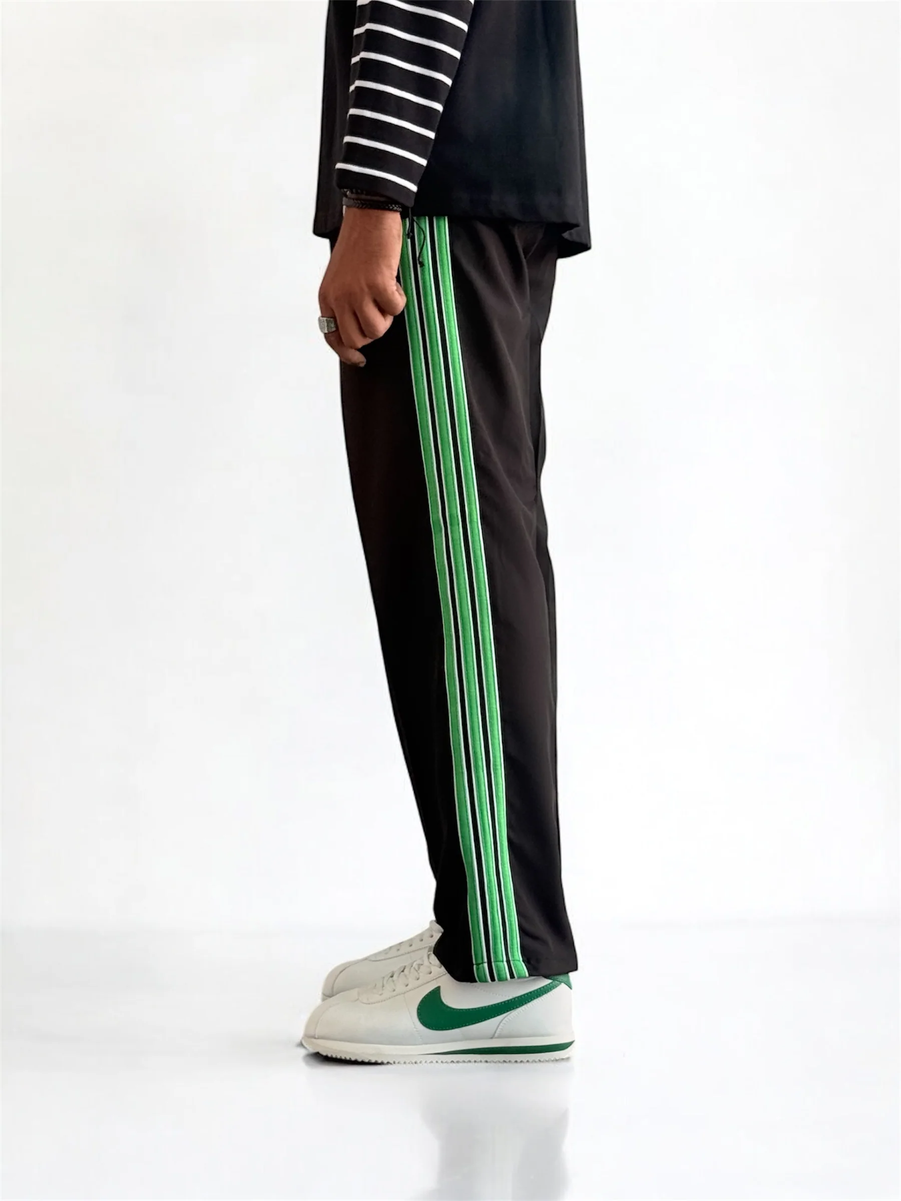 Premium straight-fit track pants for a clean, modern look (black and green ) - Image 3